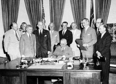 Truman signing the NATO agreement